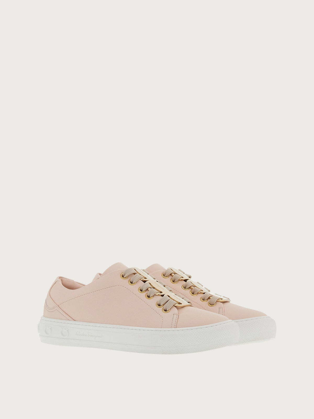 Light pink Salvatore Ferragamo Nadine platform sneaker with gold-tone eyelets, top view