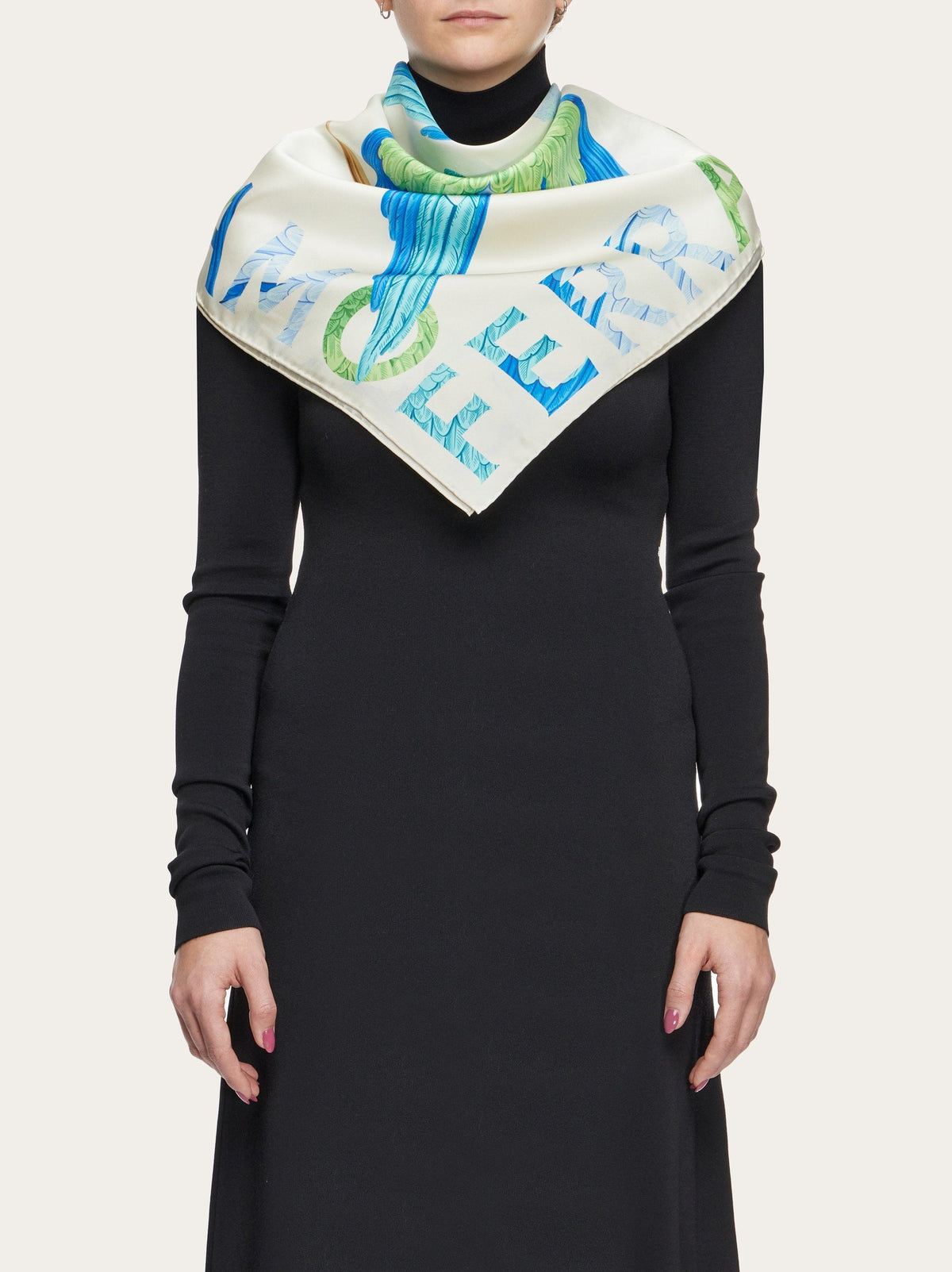 Cream Ferragamo scarf with tropical parrot motif, corner detail view