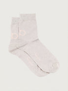 Light blush pink Salvatore Ferragamo crew sock showing Gancini motif detail