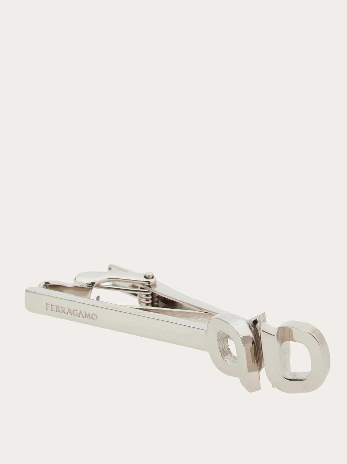 Salvatore Ferragamo silver tiepin showing bar-clip closure mechanism
