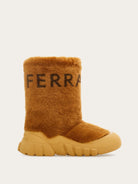 Medium brown shearling Delphi boot by Salvatore Ferragamo, side view