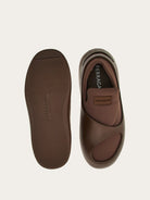 Medium brown Salvatore Ferragamo slip-on sneakers with rubber shell, rear view
