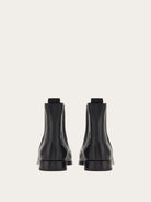 Black leather Chelsea boot by Salvatore Ferragamo, rear view