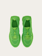 Neon lime green Salvatore Ferragamo Nima sneakers with suede detailing, angled view