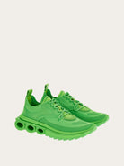 Neon lime green Ferragamo Nima sneakers, rear view showing heel construction