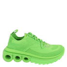Neon lime green Ferragamo Nima running sneakers, detail of knit upper and suede panels