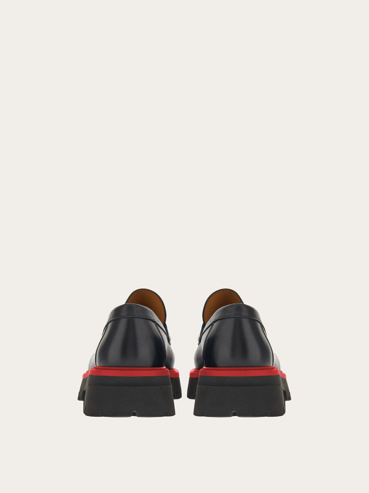Black Salvatore Ferragamo Fergal loafer top view showing debossed logo strap