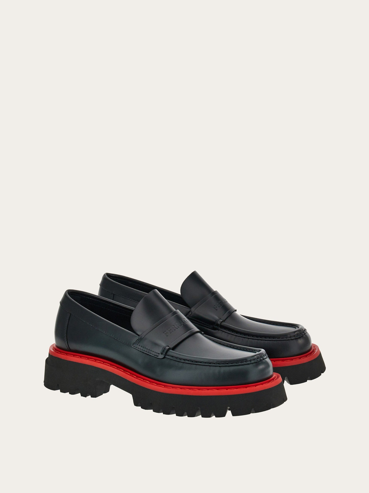 Black Salvatore Ferragamo Fergal loafer sole view with red midsole layer