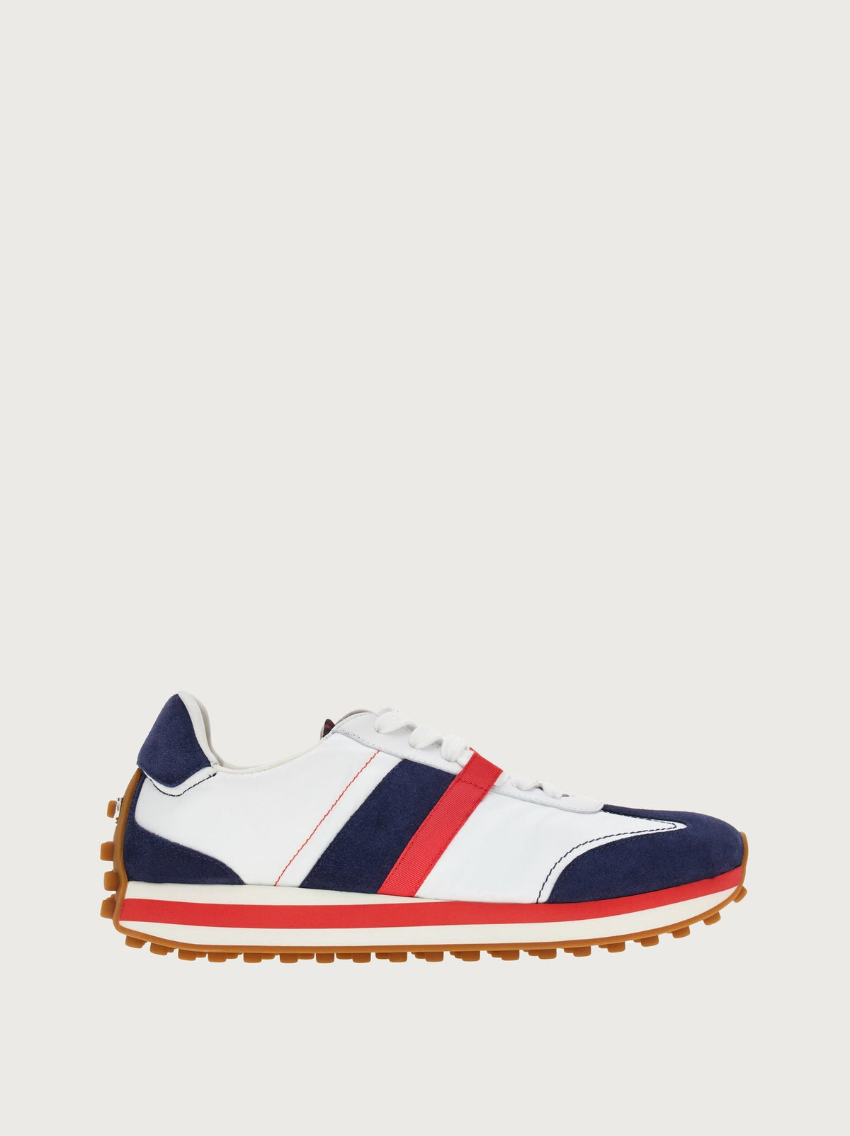 Blue color-blocked suede sneaker by Salvatore Ferragamo, side view