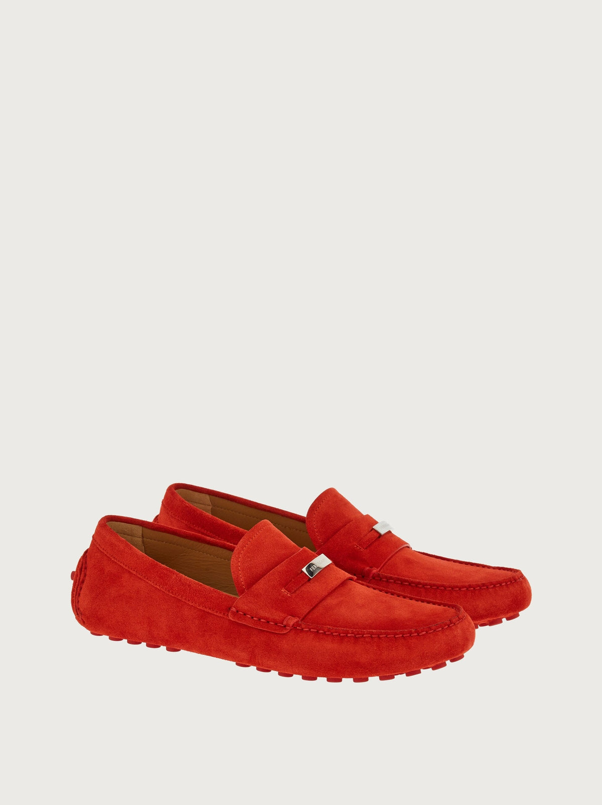 Red suede Salvatore Ferragamo penny driver, rear view
