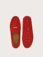 Red suede Salvatore Ferragamo driver, rubberized pebble outsole view