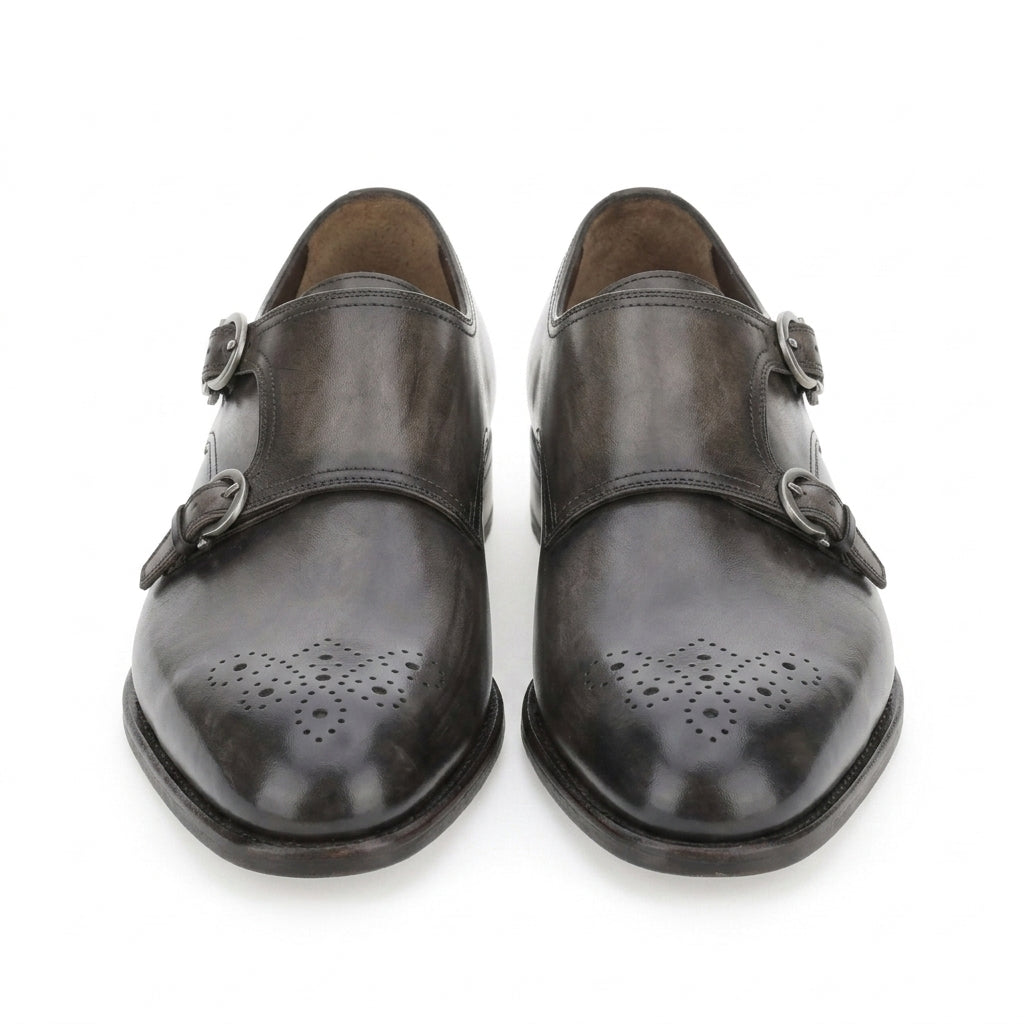 Dark grey Salvatore Ferragamo double monk strap shoe with perforated cap toe, side view