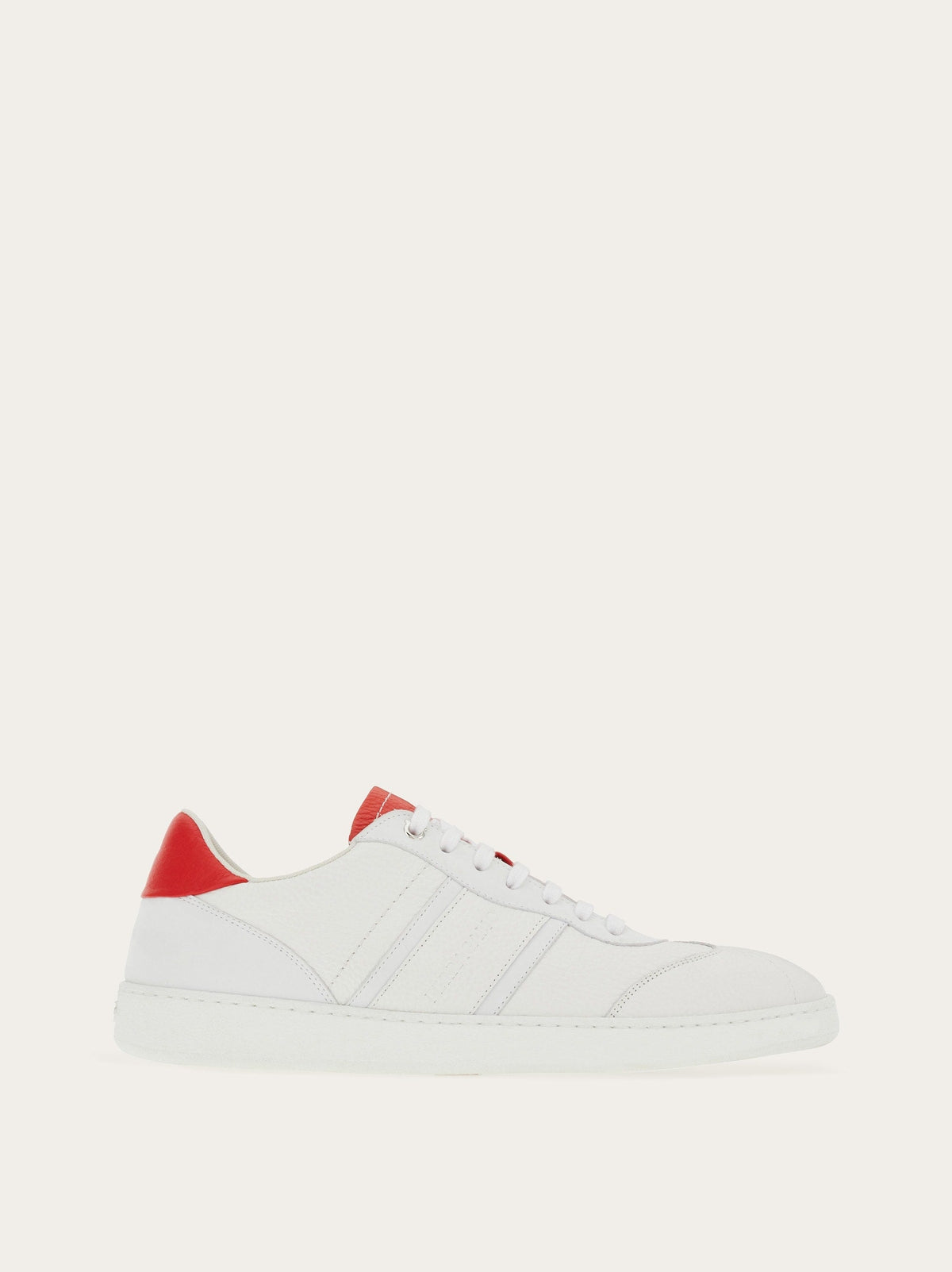 White calf leather low-top sneaker with red heel tab by Salvatore Ferragamo, side view