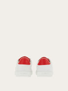 Salvatore Ferragamo white leather sneaker showing lace-up closure, top view