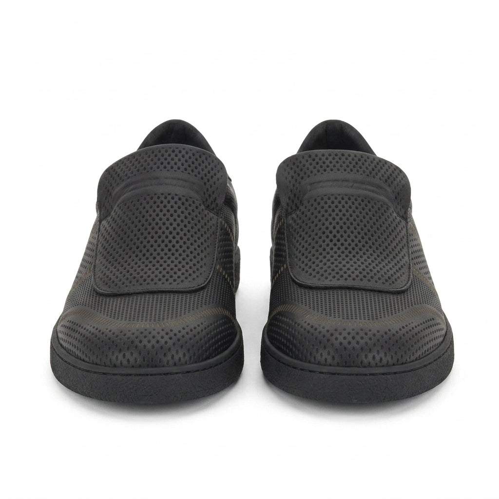 Black perforated leather Cibreo slip-on sneaker with strap closure by Salvatore Ferragamo, side view