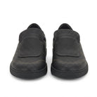 Black perforated leather Cibreo slip-on sneaker with strap closure by Salvatore Ferragamo, side view