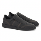 Black Salvatore Ferragamo Cibreo sneaker with perforated leather upper, front angle view