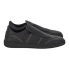 Black perforated leather Cibreo sneaker by Salvatore Ferragamo, rear view showing low-top silhouette