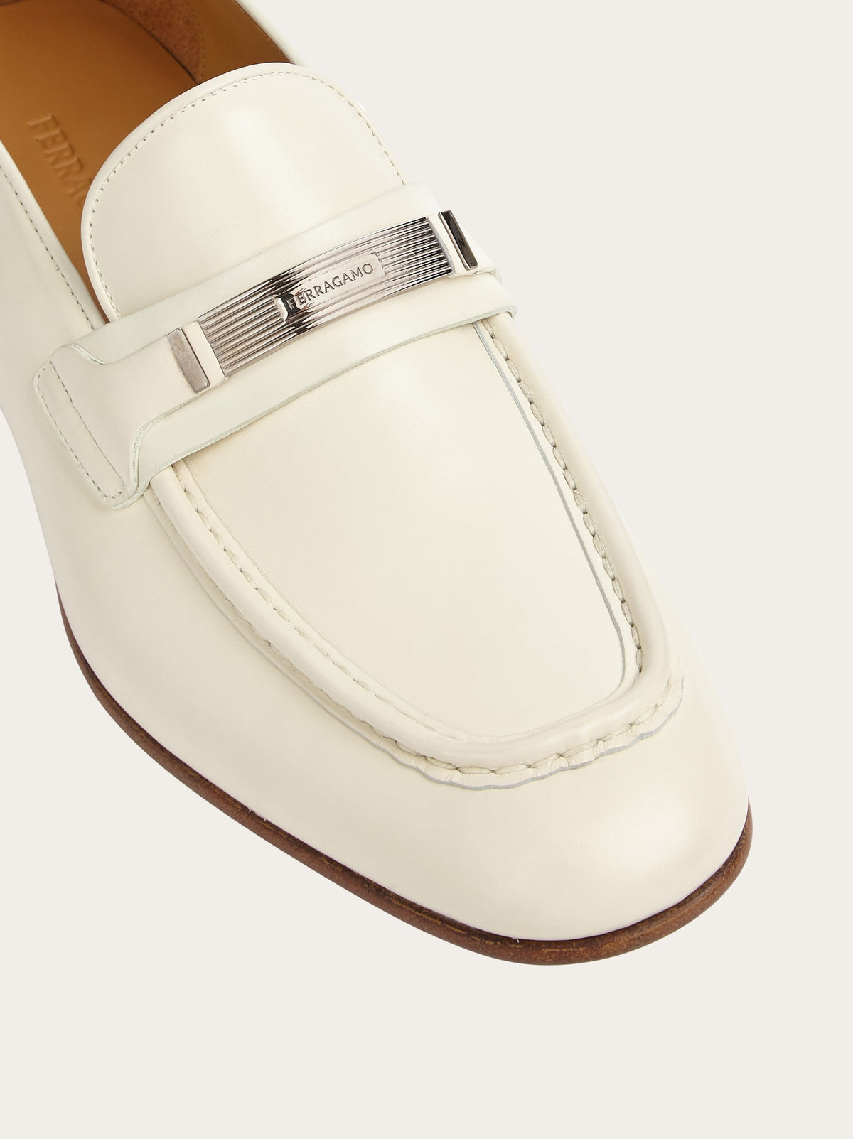 Salvatore Ferragamo off-white leather moccasin, top view showing vamp detail