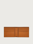 Salvatore Ferragamo leather wallet in tan showing clasp closure detail, close-up