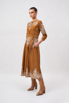 Beyond by Vera midi dress showing long sleeves and embroidered pattern detail