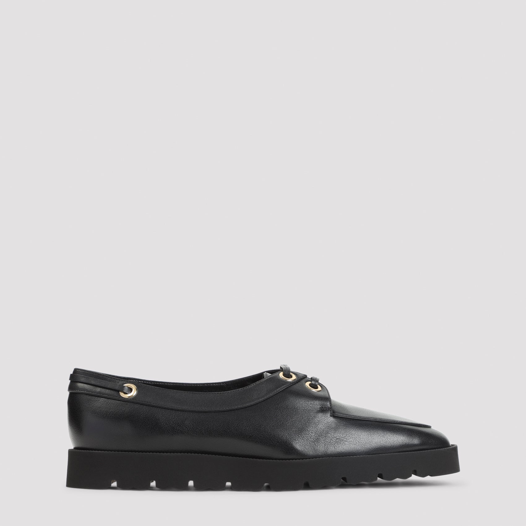Black Celine chunky loafer in calfskin, side view by Celine