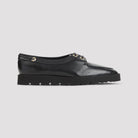 Black Celine chunky loafer showing serrated EVA sole, bottom view by Celine