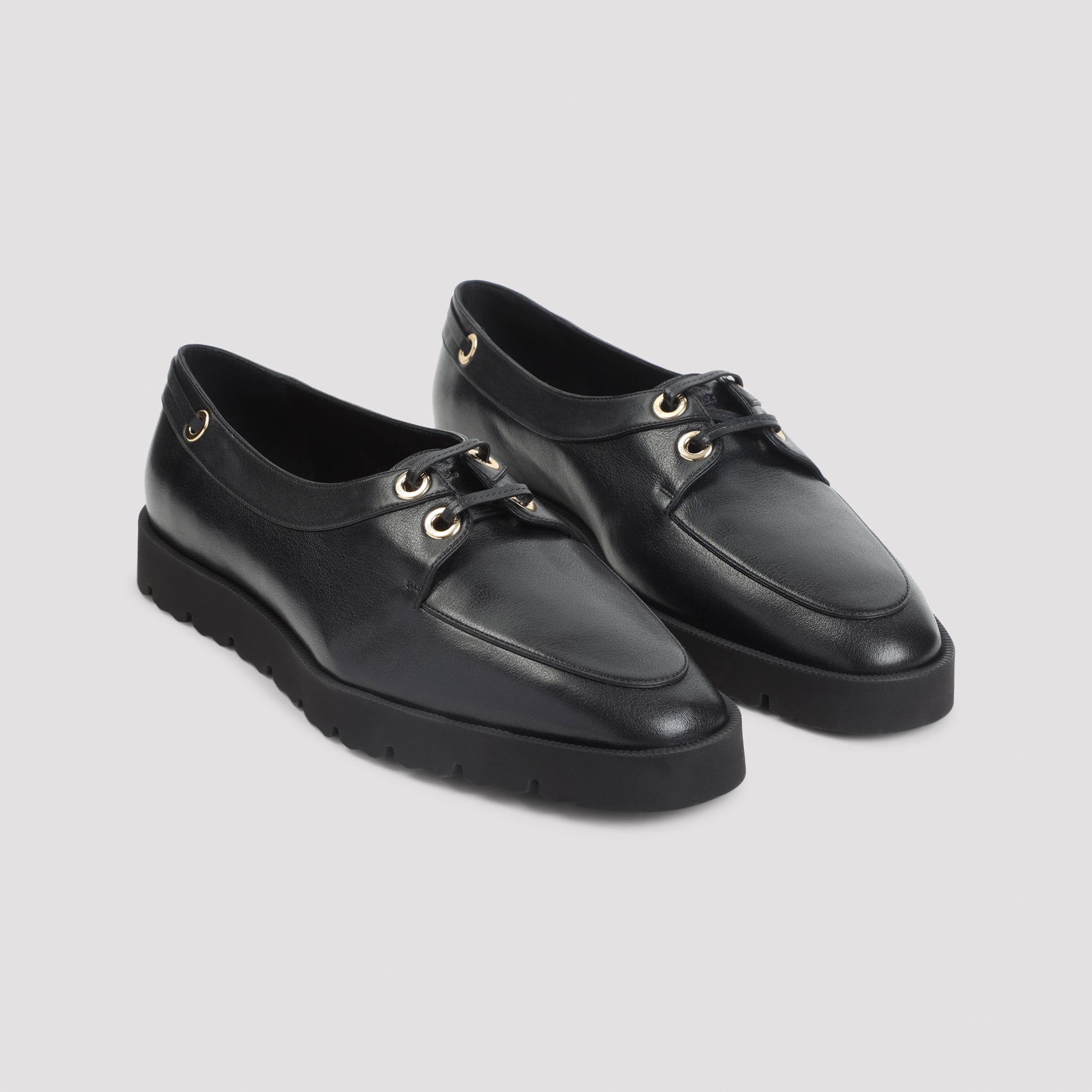 Black Celine chunky loafer detail of engraved eyelets by Celine
