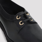 Black Celine chunky loafer rear view showing heel by Celine