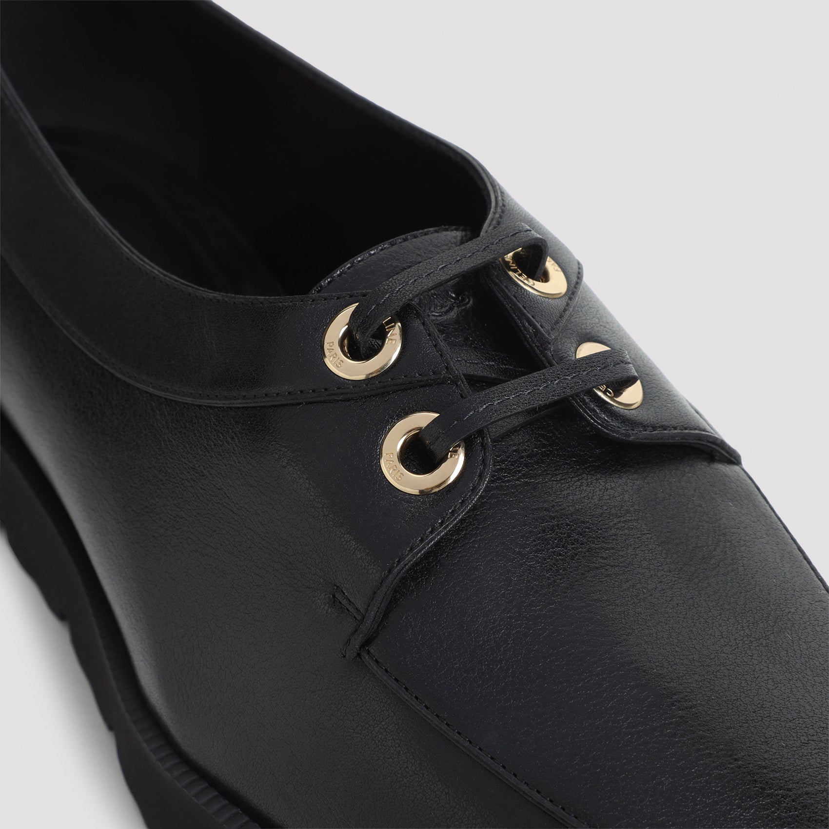 Black Celine chunky loafer rear view showing heel by Celine