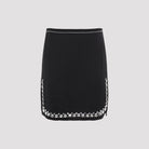 Black Rabanne mini skirt with studded sequin trim, front view
