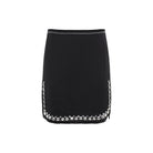 Black Rabanne mini skirt with asymmetric hem, side view