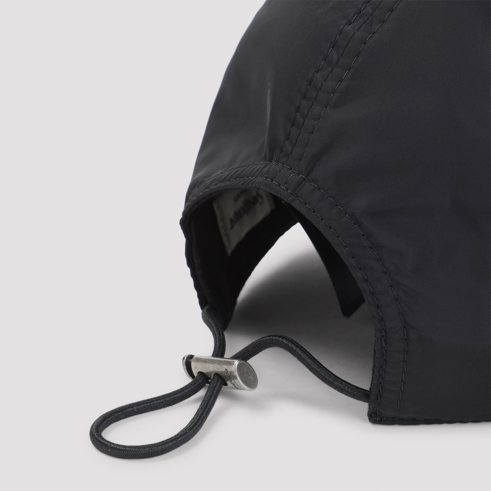 Black Saint Laurent baseball cap with adjustable back closure, rear view