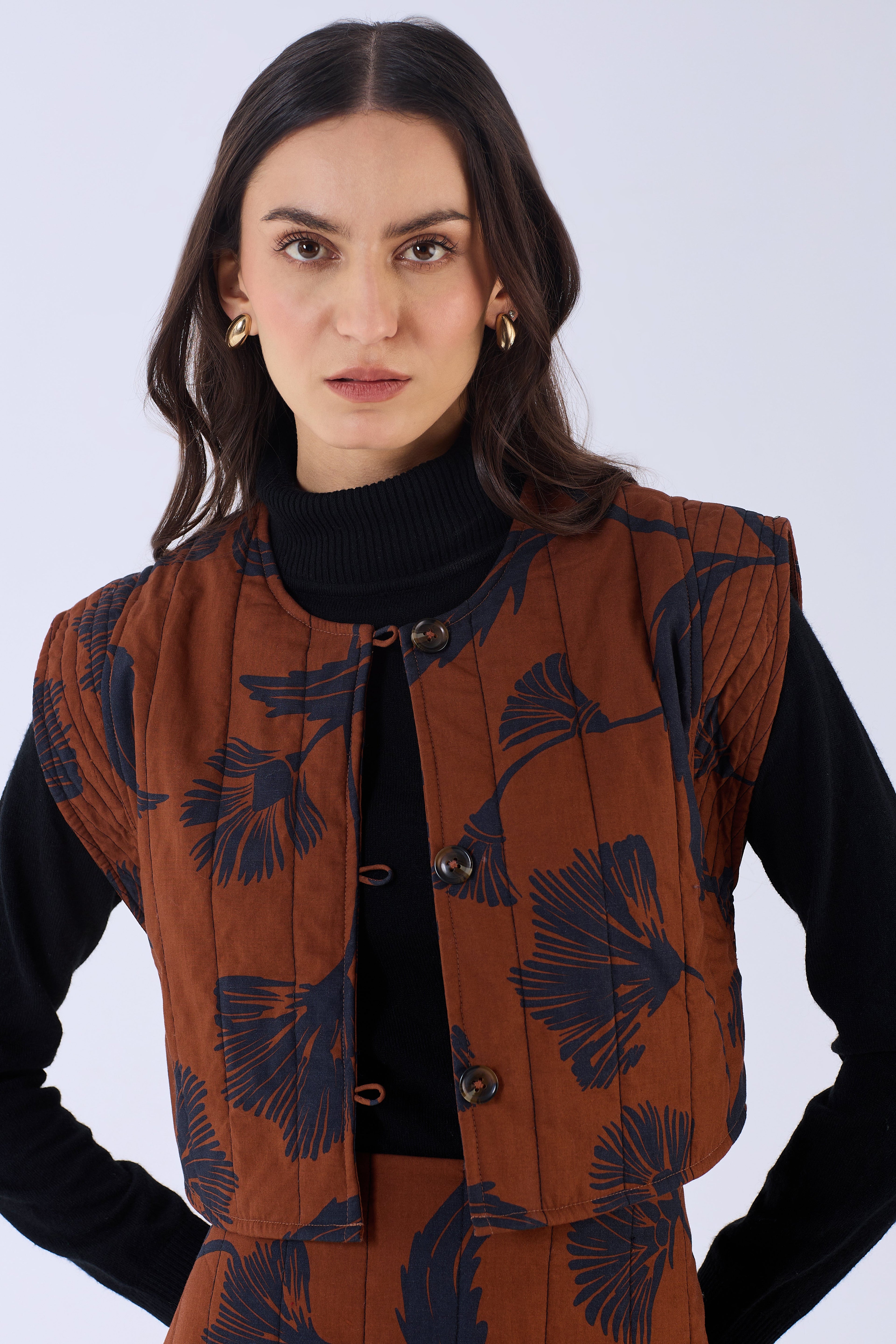 Beyond by Vera quilted vest with shadow floral print, close-up detail