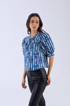 Multicolor floral Lilly blouse by Beyond by Vera, worn side angle