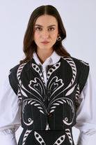 Cotton poplin quilted vest with cropped waist, three-quarter view