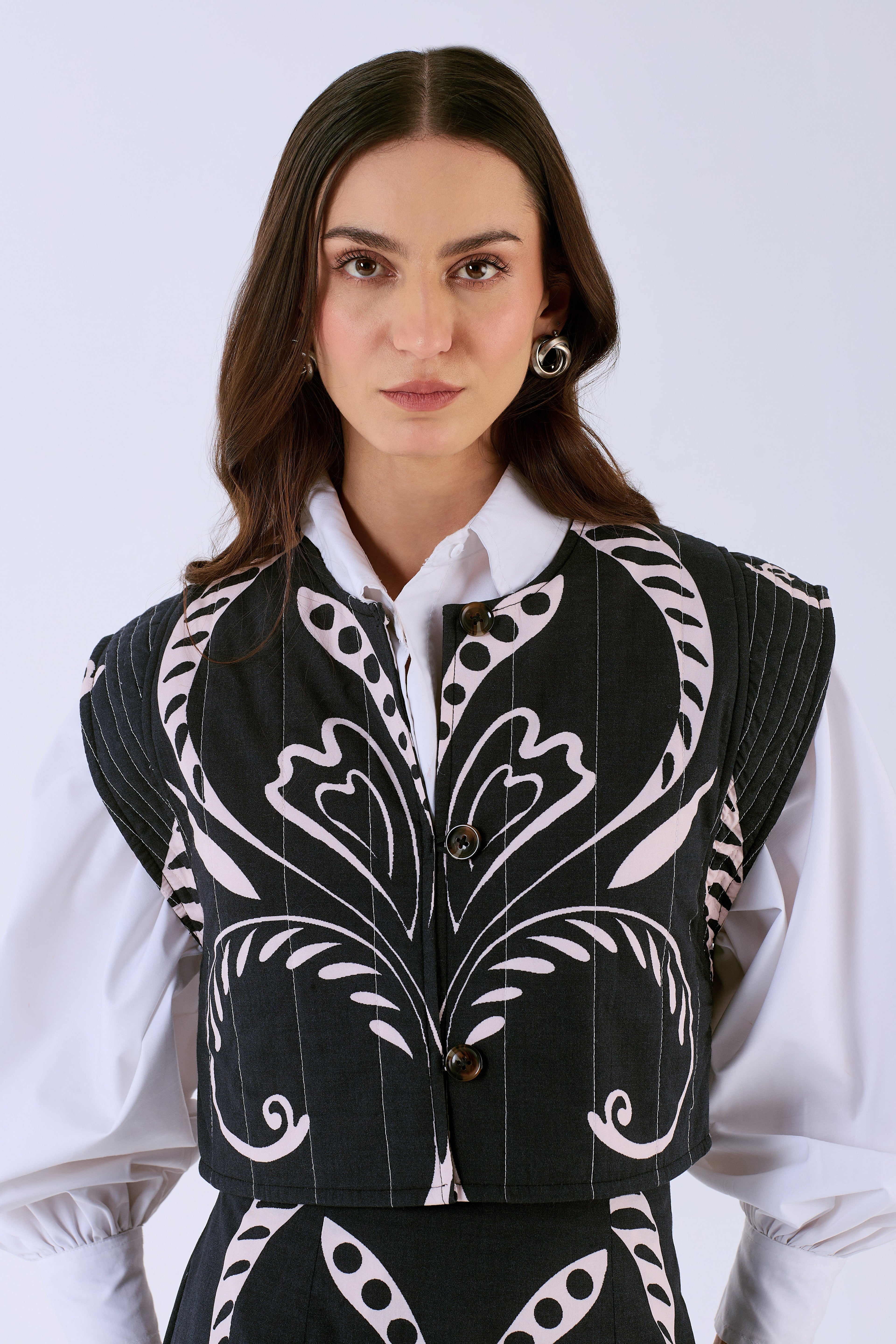 Cotton poplin quilted vest with cropped waist, three-quarter view