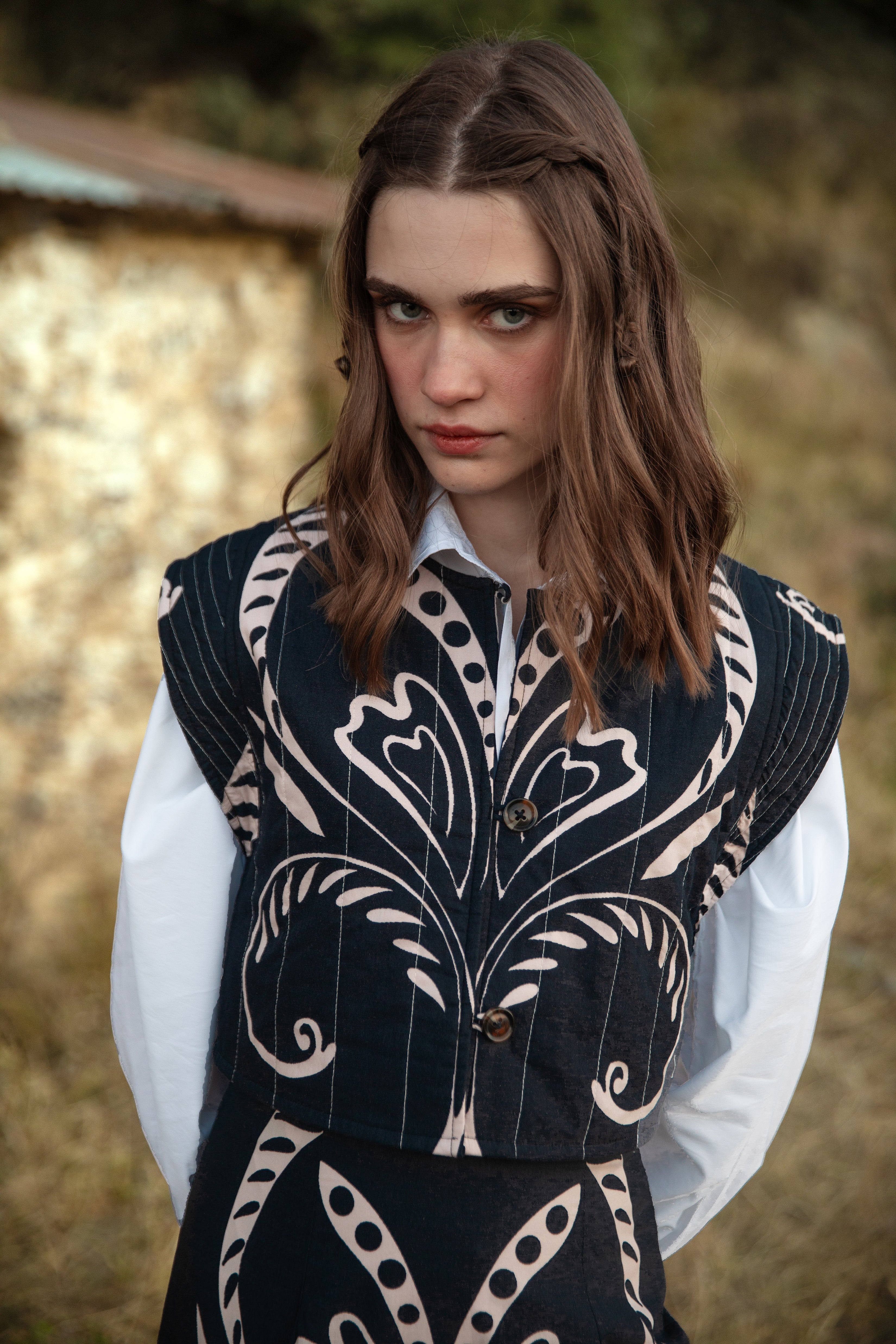 Beyond by Vera Lexie vest with button closure and cap sleeves, styled front view