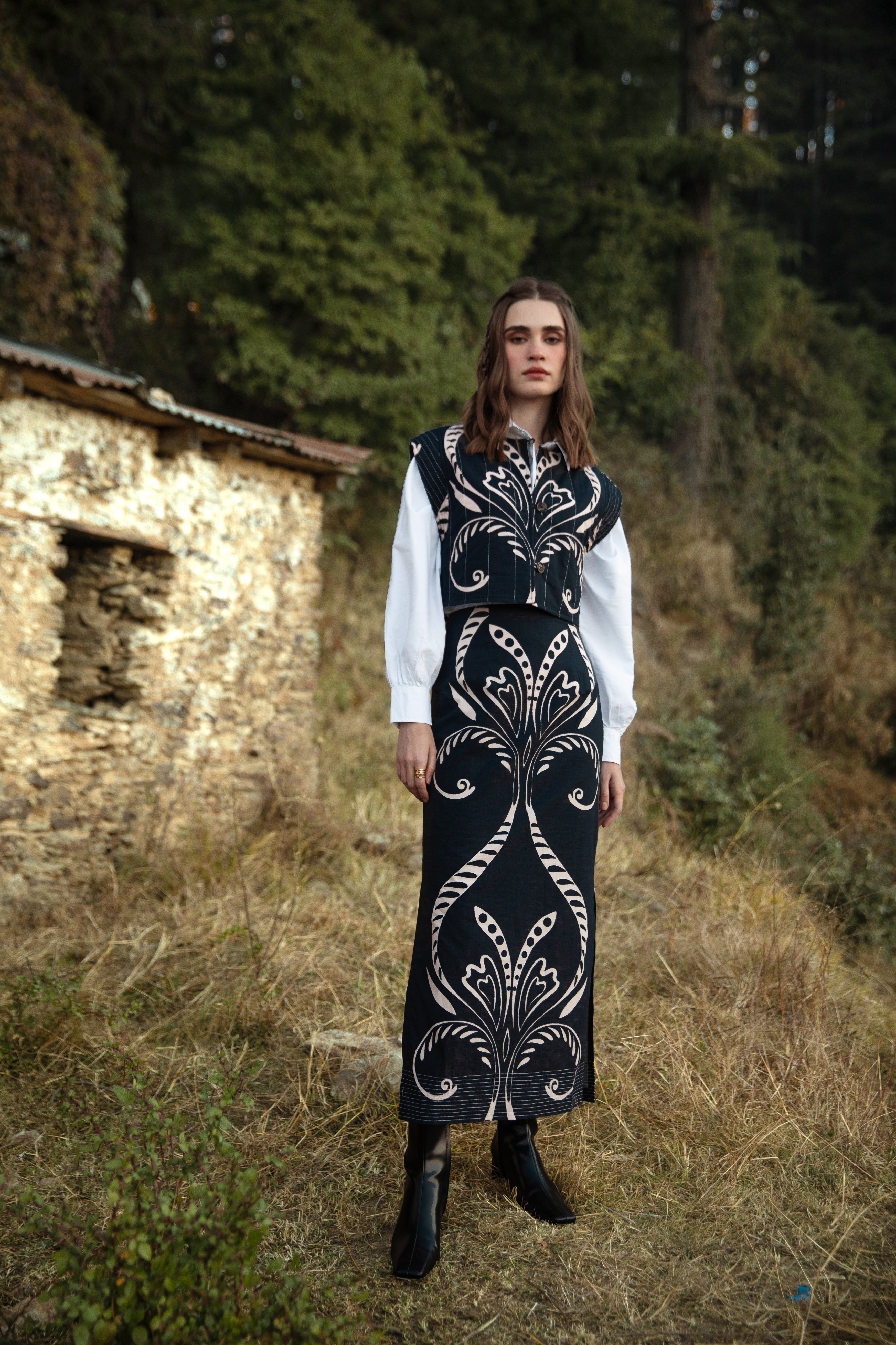 Beyond by Vera Aspen midi skirt in Fountain print, side view showing slit detail