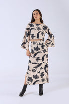 Beyond by Vera black floral skirt, close-up of fitted waist and silhouette