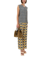 Yellow silk blouse by 'S Max Mara, detail view of fabric drape and construction