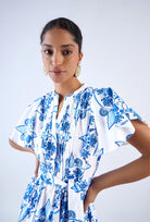Aqua midi dress with pleated bodice and belt by Beyond by Vera, three-quarter view