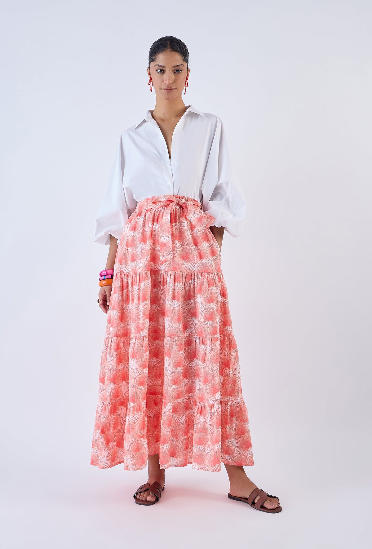 Serenity palm print midi skirt with tiered A-line silhouette by Beyond by Vera, front view