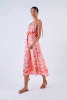 Drew dress with ruffle details and waist drawstring, three-quarter view