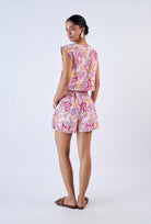 Floral cotton poplin shorts by Beyond by Vera, side view showing pleats