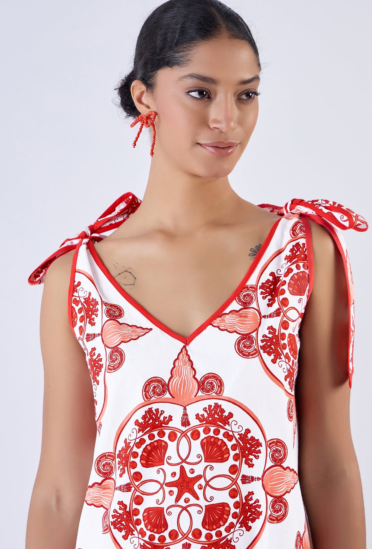 Multicolor Nautilus print mini dress by Beyond by Vera, side angle