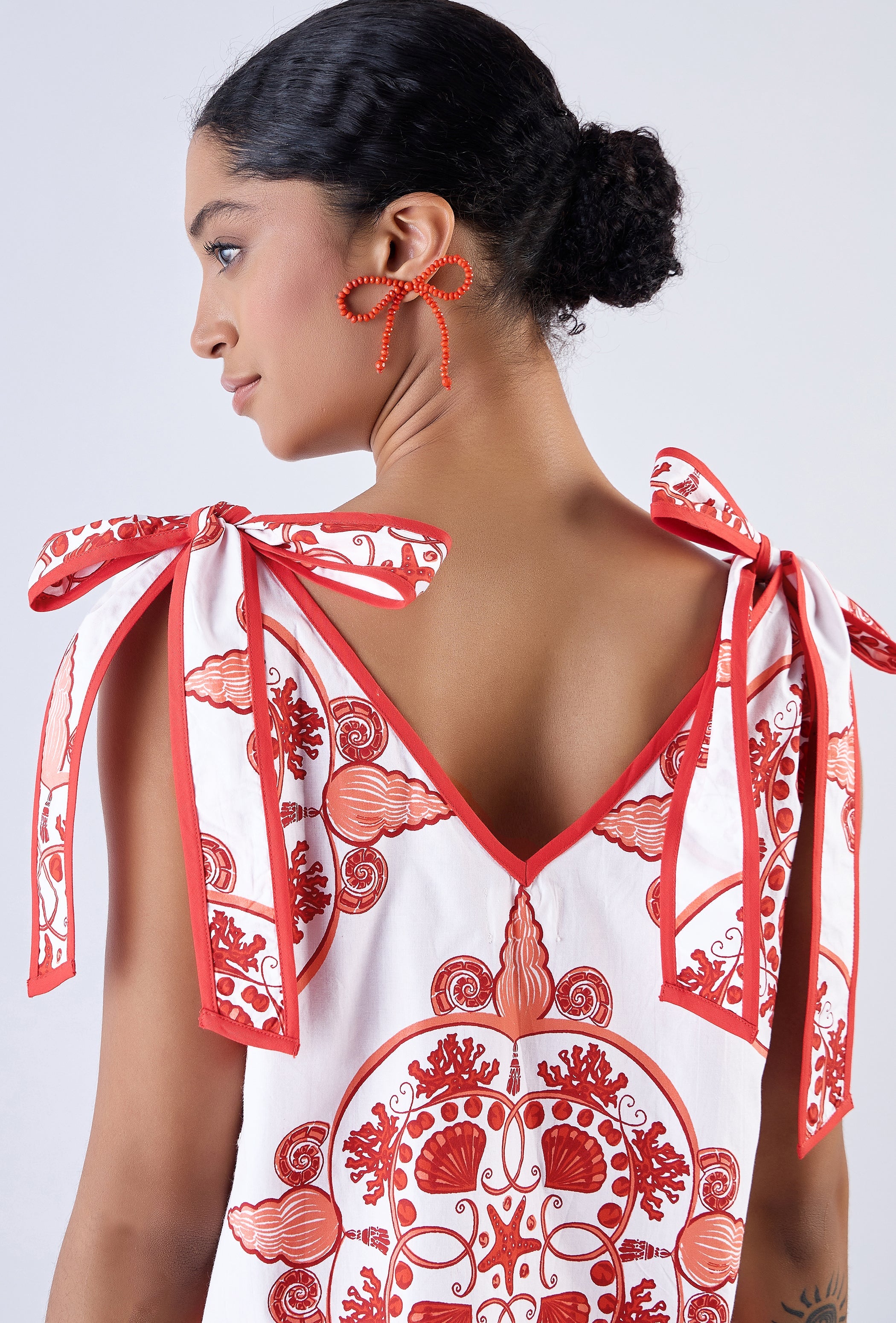 Multicolor Nautilus print mini dress by Beyond by Vera, V-neckline close-up