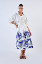 Navy A-line midi skirt with elastic waistband, side angle