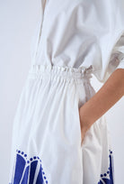 Beyond by Vera Amber skirt with Botticelli-inspired print, three-quarter view