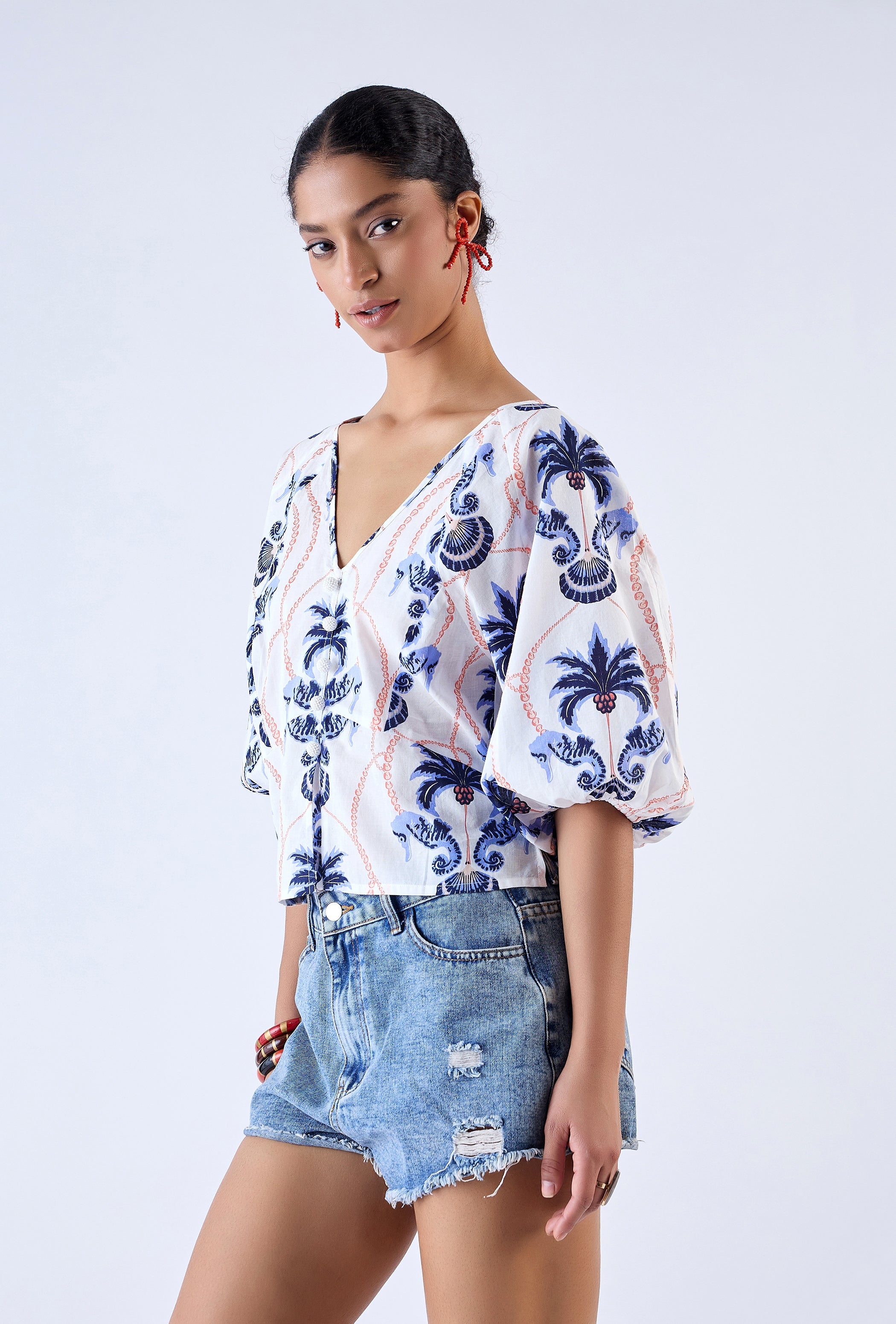Floral blouse with balloon sleeves and elasticated cuffs by Beyond by Vera, side view